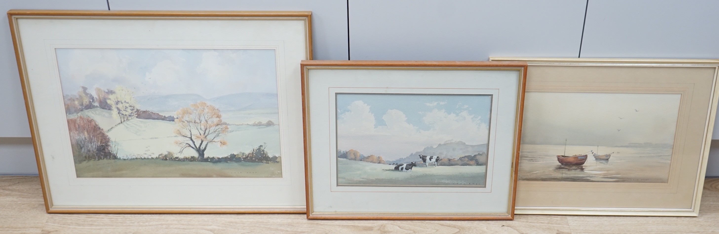 Jack Amey (20th C.), three watercolours, 'Spring at Amberley', 'Cattle at Washington' and 'Beached fishing boats', signed, largest 31 x 47cm